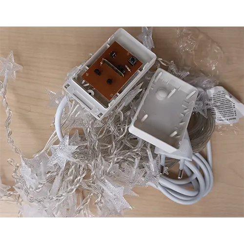Lighting chain with non-replaceable LED light sources, equipped with electronics for lighting effects with a switch.