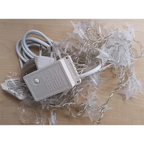Lighting chain with non-replaceable LED light sources, equipped with electronics for lighting effects with a switch.