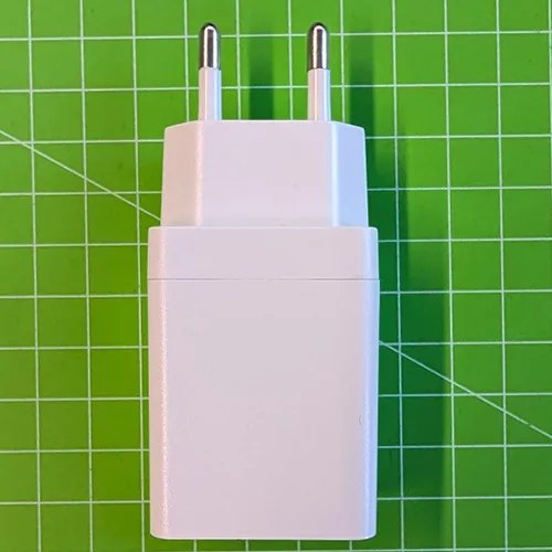 Empty USB power supply (without a circuit board). The housing can be opened to hide money or similar small items inside.