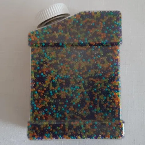 Multicoloured water beads, which grow when immersed in water, intended for use as ammunition in a toy rifle, 250 g.