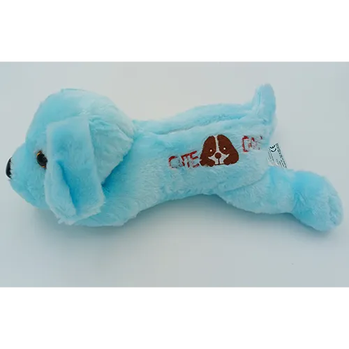 Soft toy in the shape of a dog with battery compartment.