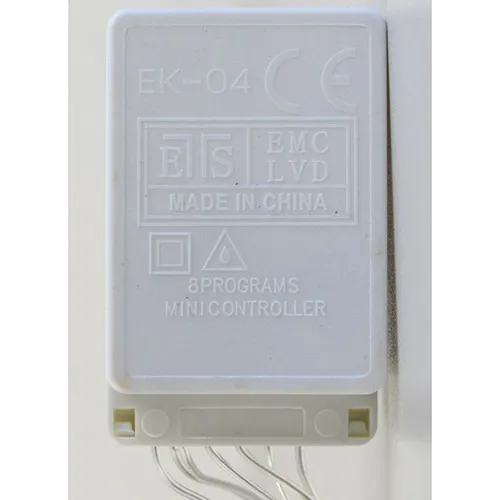 Mains-powered, series-connectable Christmas lighting chain with a transparent cable, 144 LED lights, and a white control box. The device is equipped with an EK-04 model 8-program mini controller. Technical data: 220 V, Class II appliance.