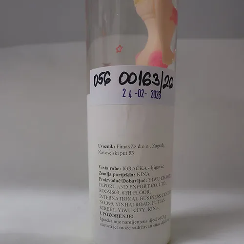 Toy slime with a doll.