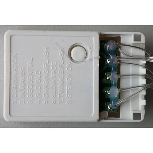 Mains-powered Christmas LED lighting chain in the shape of a five-pointed star, equipped with a white 8-function control box and a series connection socket. Technical data: 220 V.