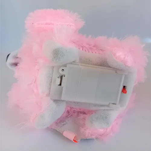 Plastic toy in the shape of a dog ​​with elements. Hard plastic frame covered with soft plush fabric.