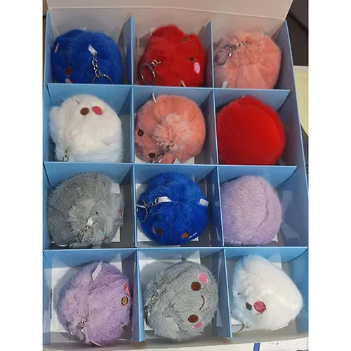 Soft squeeze toy keyring in the shape of a Chinese dumpling.