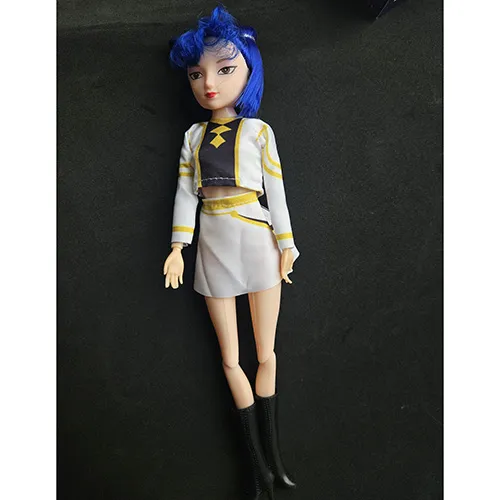 Plastic doll with colourful clothes.