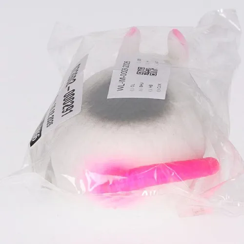 Toy made of stretchy plastic in the shape of a mouse, filled with sand.