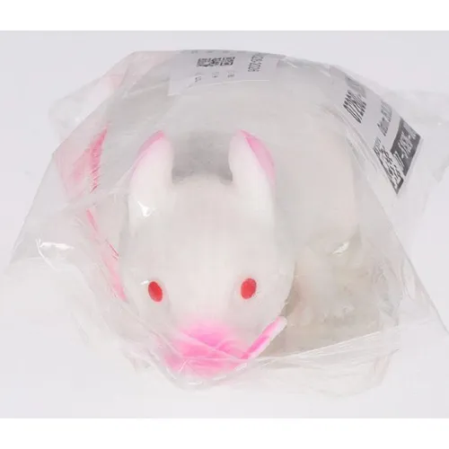Toy made of stretchy plastic in the shape of a mouse, filled with sand.