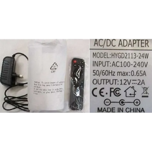 White-coloured projector supplied with AC adapter and black remote control.