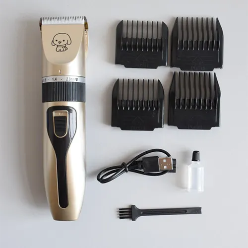 Cordless rechargeable pet hair clipper trimmer supplied with 4 exchangeable attachment heads and accessories.