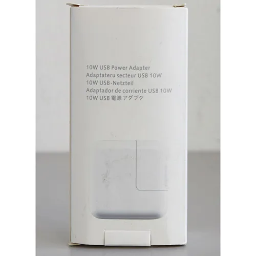 White battery charger with a USB-A port and Micro-USB cable. Input: 100-240V, 50-60Hz. Output: 5.1V, 2.1A.