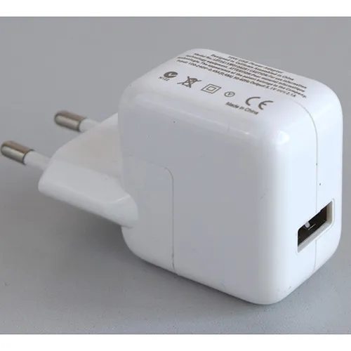 White battery charger with a USB-A port and Micro-USB cable. Input: 100-240V, 50-60Hz. Output: 5.1V, 2.1A.