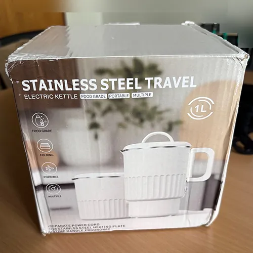 Foldable, black travel camping kettle, 100 ml  – 600 W 304. Made of stainless steel, advertised as BPA-free – double-walled design with automatic temperature control and continuous boiling function.