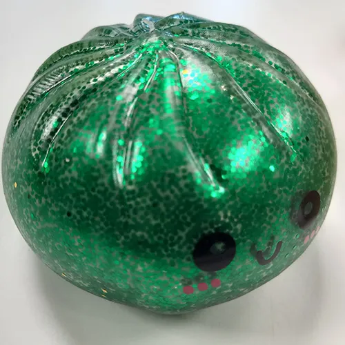 Squeeze toy in the form of a bun sold in sets of 3 items.