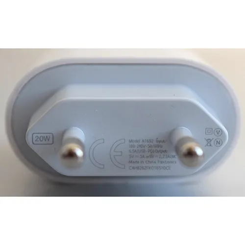 White battery charger with one USB-C output port, integrated with a mains plug.
