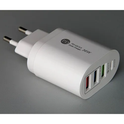 White mains wall USB charger integrated with a European plug, featuring three USB Type-A output ports and one USB Type-C output port.