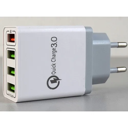 White and grey plastic USB charger with an integrated European plug, featuring four USB Type-A output ports on the face interface, with one port highlighted for quick charging.