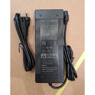 Electric bicycle with wall plug and power adapter.