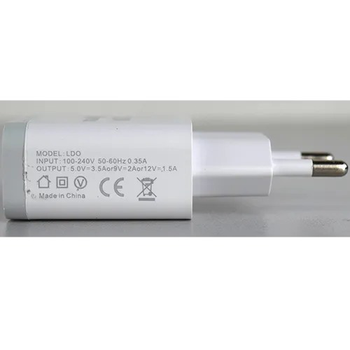 White plastic mains wall charger with one USB Type-A output port, sold with a separate white cable.