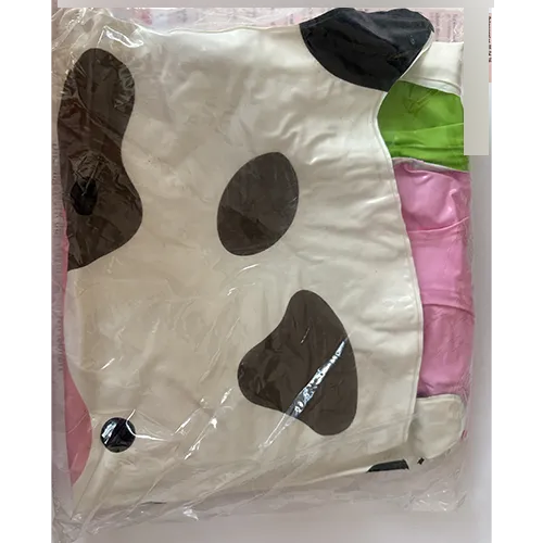 Green and white inflatable swim seat in the shape of a cow