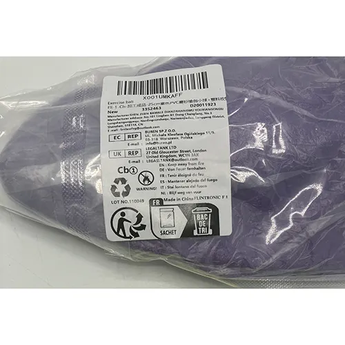 Purple yoga ball made pf soft PVC.