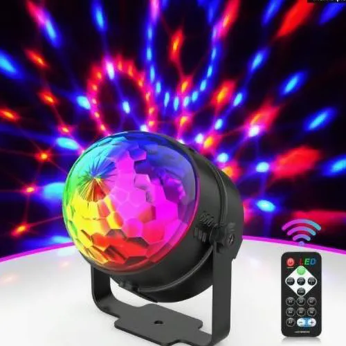 Remote-controlled and music-activated 360°-rotating mini LED red, green and blue light. Voltage 100-240 V AC – Protection Class II.