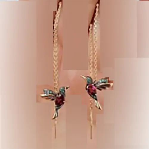 Dangling earrings with a hummingbird design.