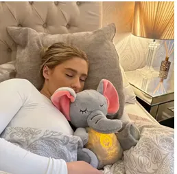 Elephant plush toy with speaker.