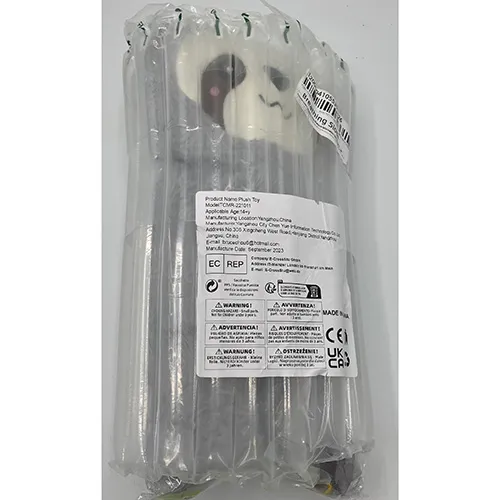 Plush sloth toy with speaker.