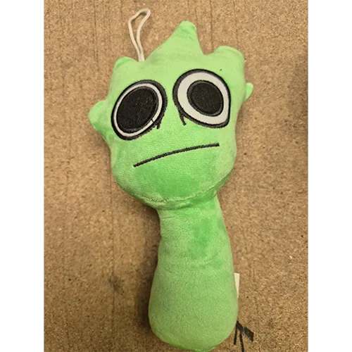 Green soft toy.